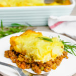 Easy Shepherd's Pie- A delicious shepherd's pie recipe complete with ground lamb or beef, and topped with mashed potatoes and butter