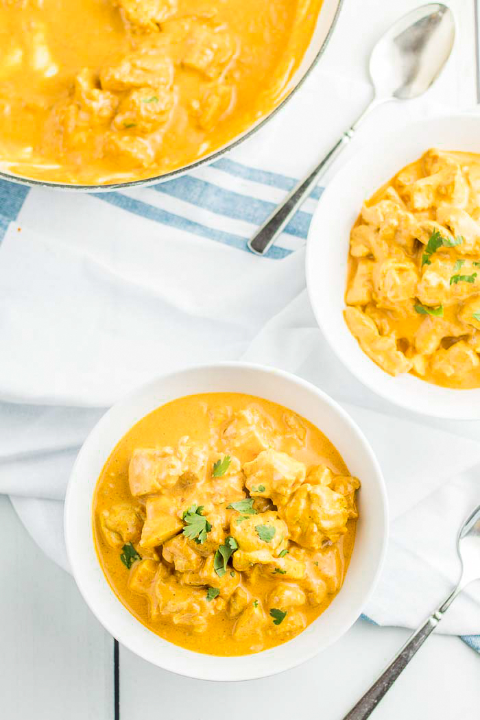 Indian butter chicken in two bowls