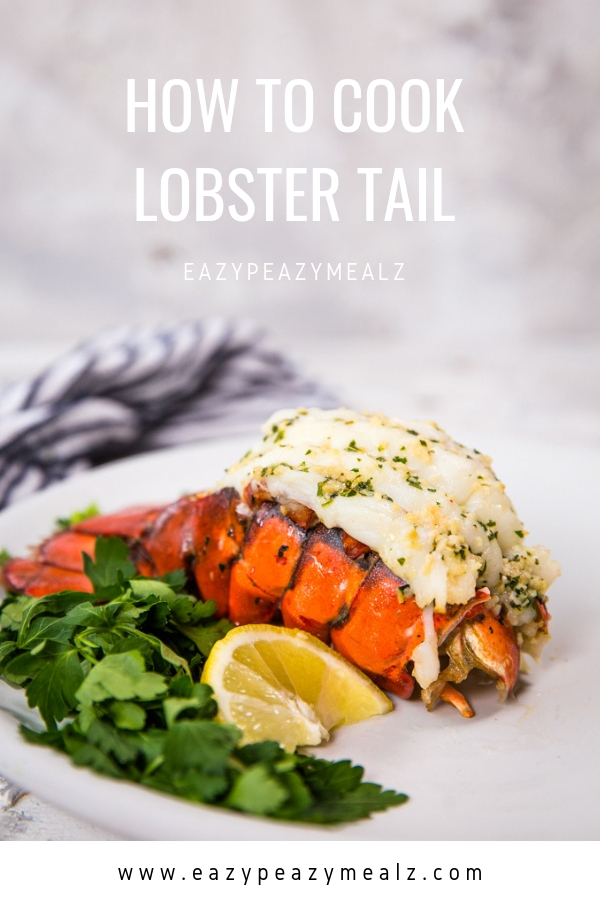 Cooked lobster tail on a white plate with parsley and lemon wedge, with the words How to cook lobster tail as an overlay