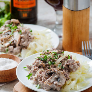 low carb beef stroganoff with pepper grinder in back ground