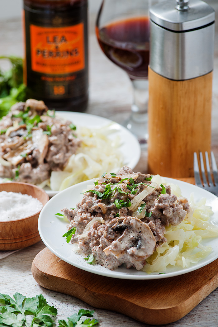 low carb beef stroganoff with pepper grinder in back ground