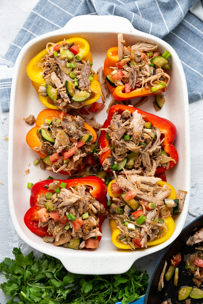 Pork Stuffed Peppers in a baking sheet, before it is topped with mozzarella