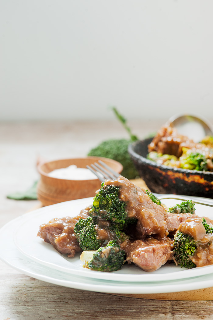 beef and broccoli keto dish view from straight on, wall in back