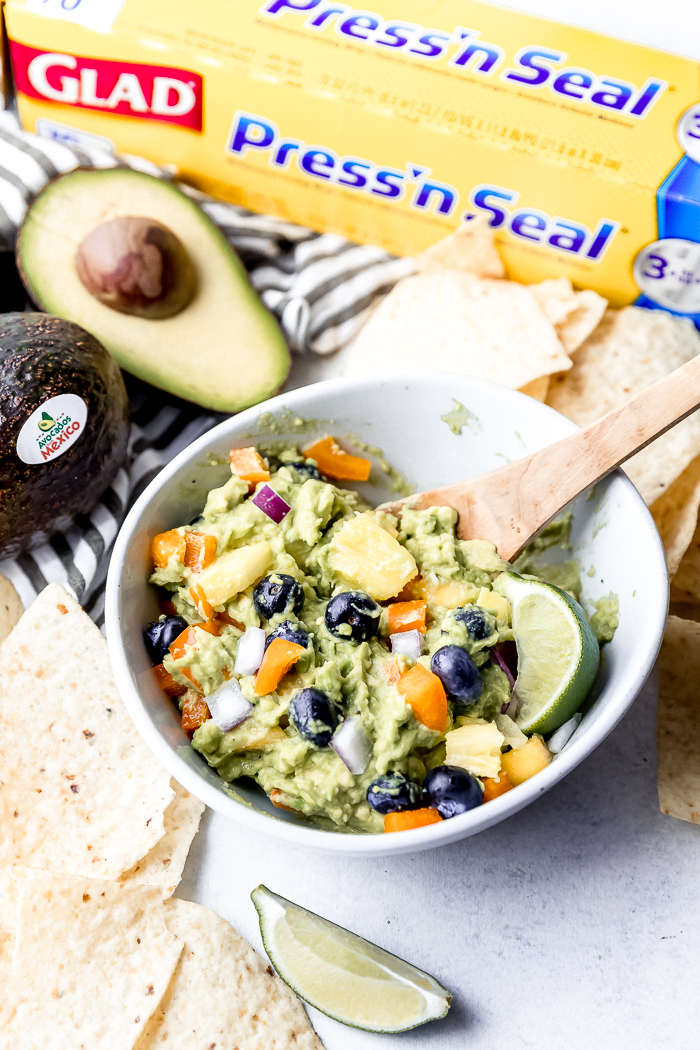 A bowl of make your own guacamole with fun fruit mixins