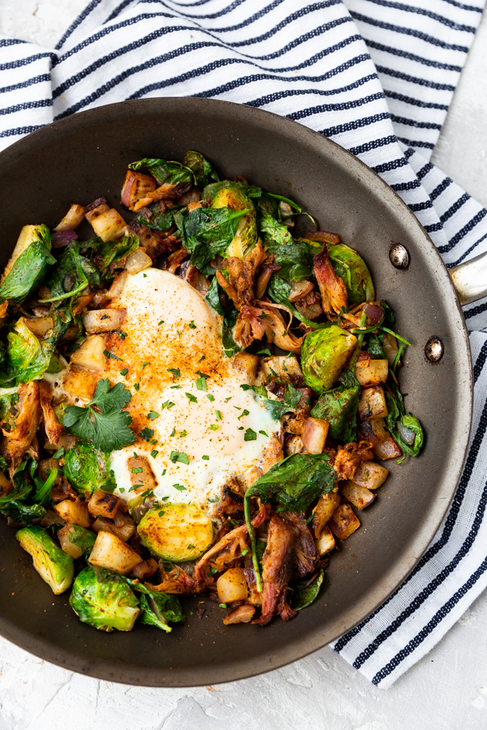 A skillet full of pulled pork breakfast hash