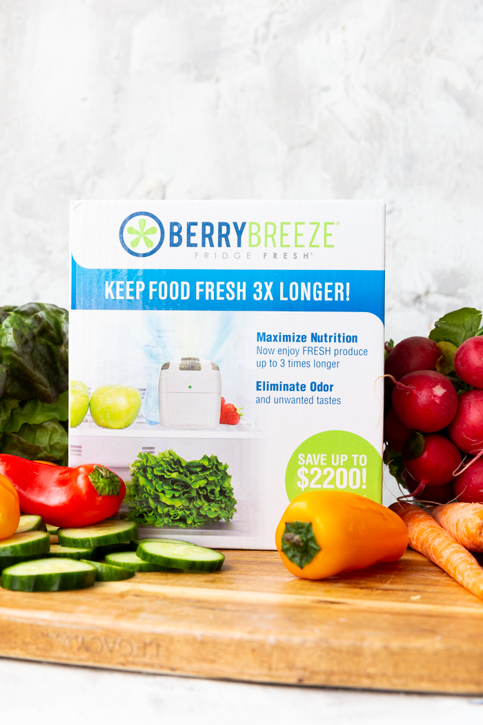 Berry Breeze Fridge Fresh in the box on a cutting board with fresh produce