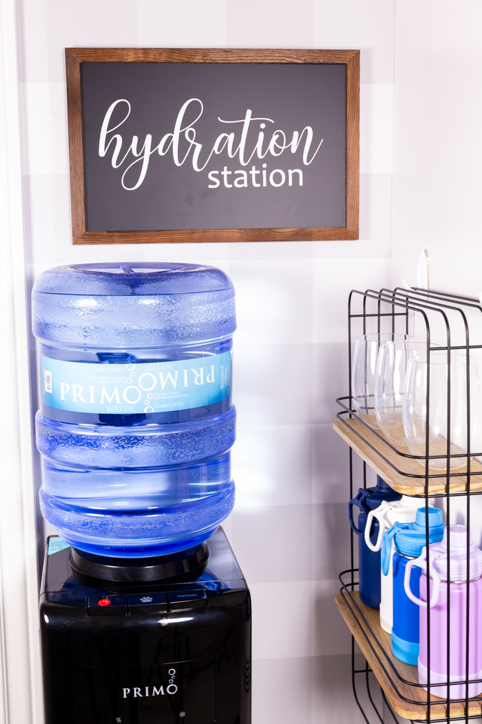 The hydration station, a water dispenser and shelf to hold bottles