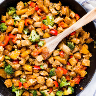 A skillet filled with teriyaki chicken stir fry