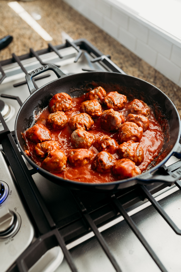 A skillet full of meatballs and manwich sloppy joe sauce