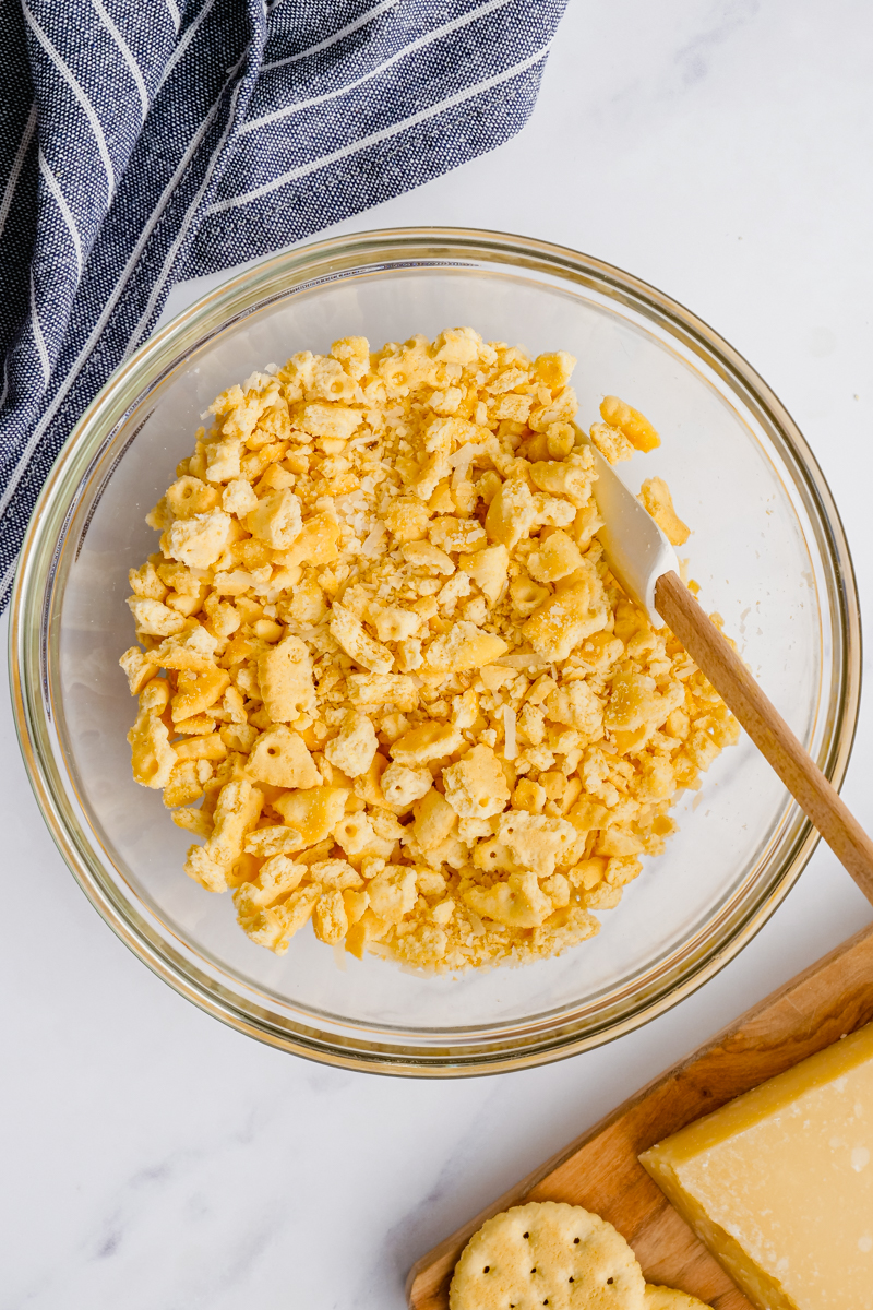 a bowl of cracker mixture assembled to go over top zucchini