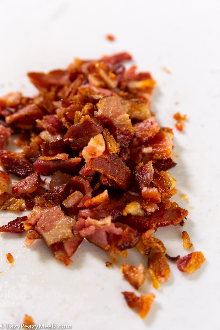 Cooked and rough chopped bacon
