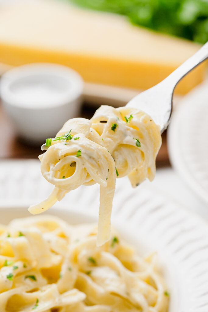 the creamiest fettuccine alfredo on a fork