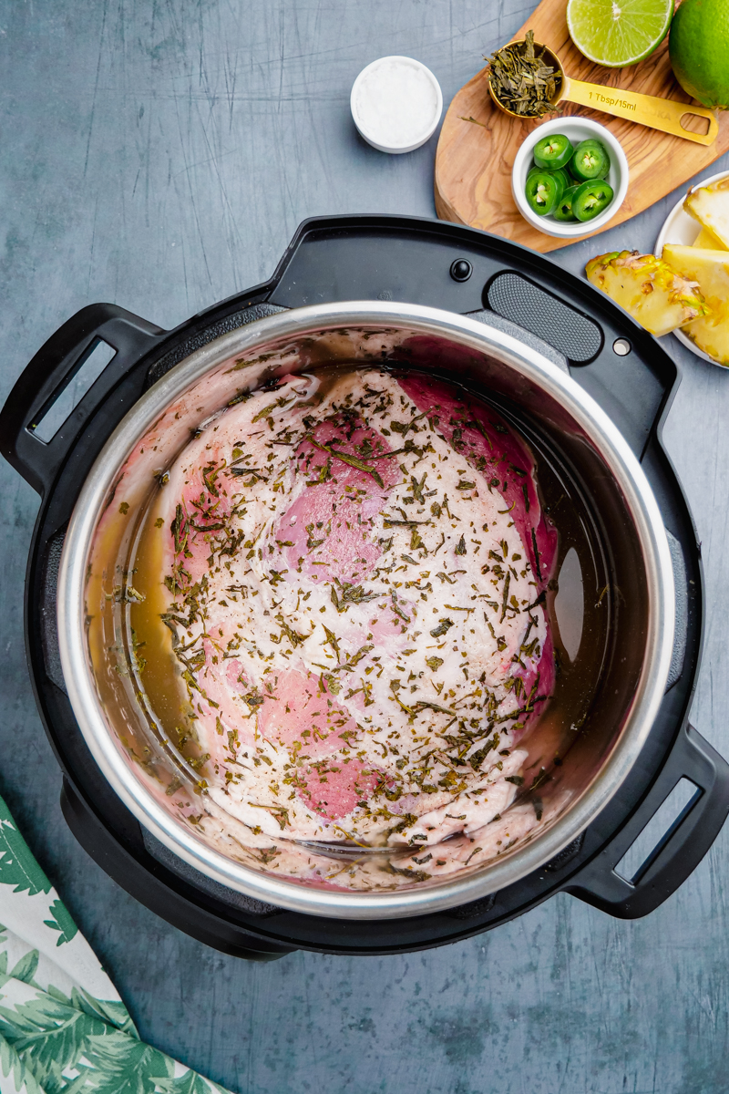 Kalua pork in an instant pot before being cooked