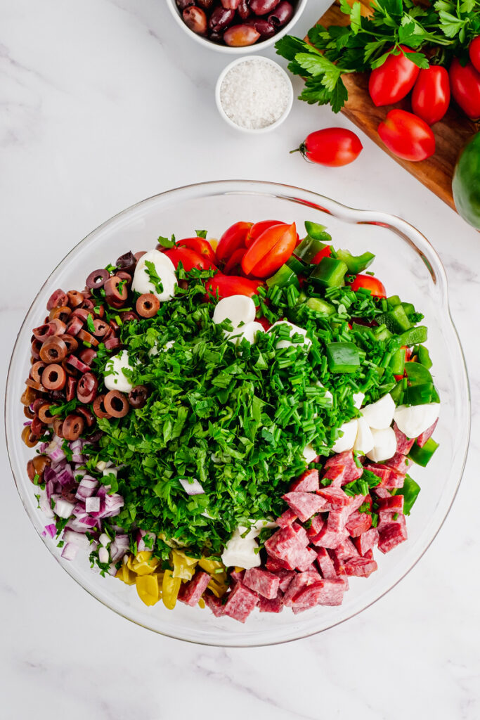 Making antipasto pasta salad