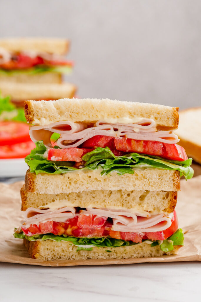 A sandwich made on sandwich bread