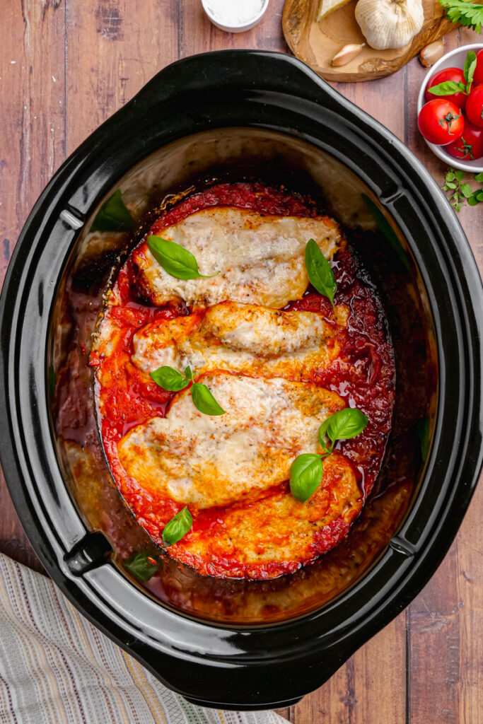 chicken pomodoro in a black slow cooker