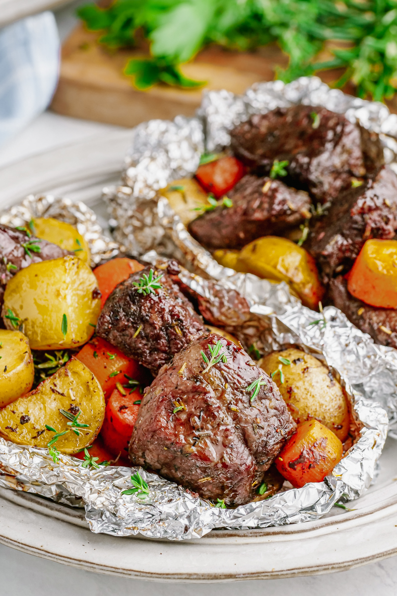 Steak foil packs with carrots and potatoes.