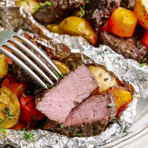 steak and potato foil pack with fork