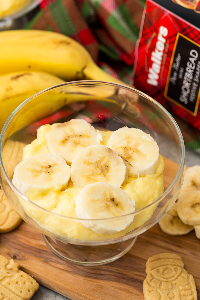 Bananas layered over top of eggnog banana pudding.