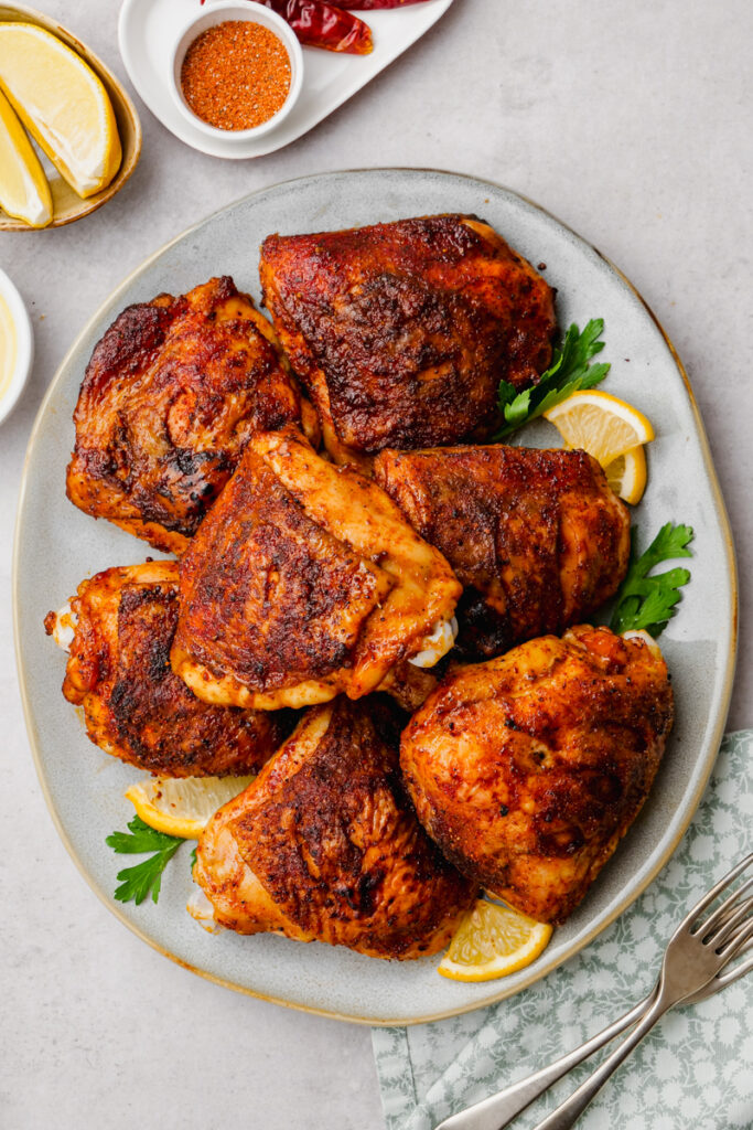 Roasted chicken thighs on a platter