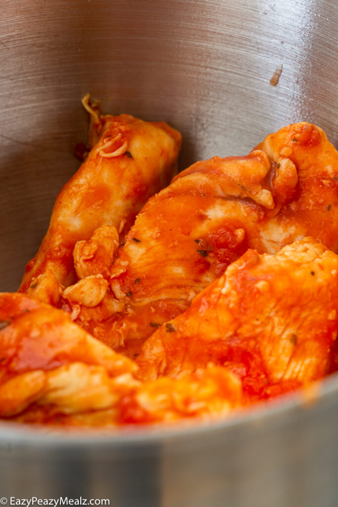 Chicken in a kitchenaid mixer to be shredded