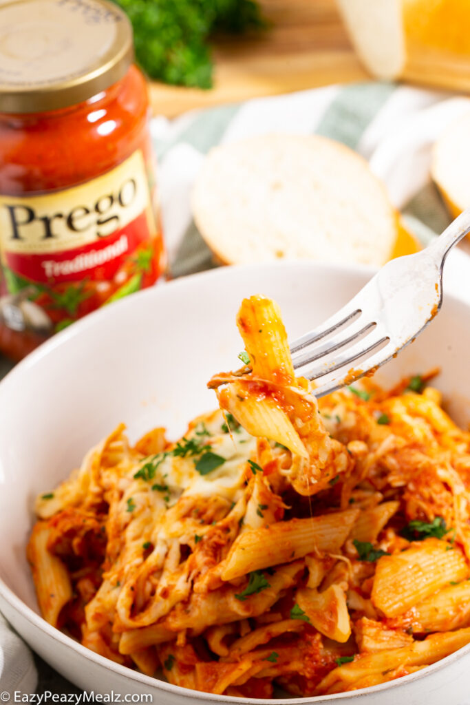 A bowl of chicken parmesan casserole