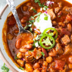 Brisket chili in a bowl with toppings