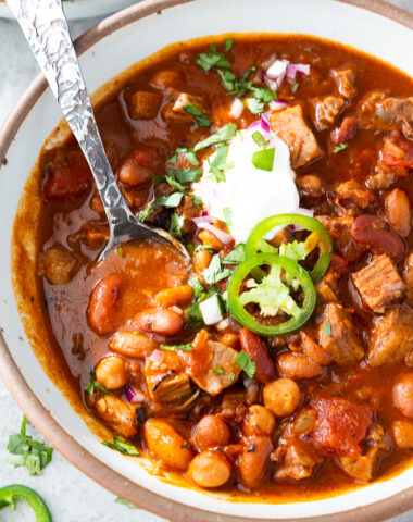 Brisket chili in a bowl with toppings