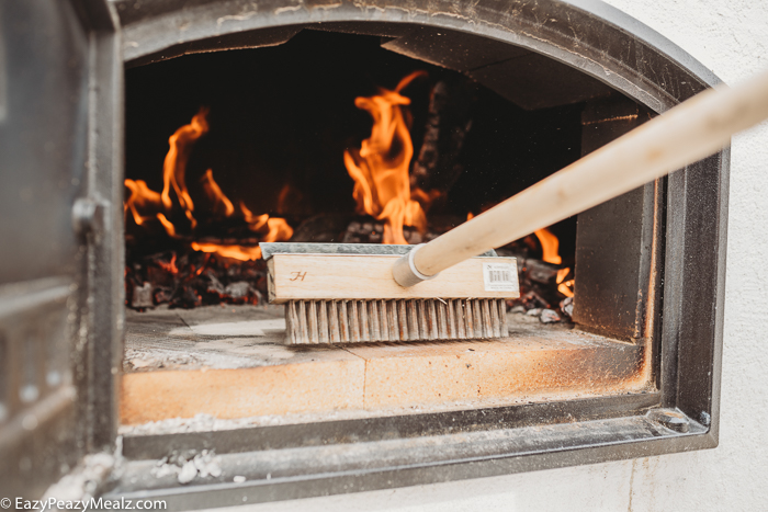 cleaning a brick oven or pizza oven with heat