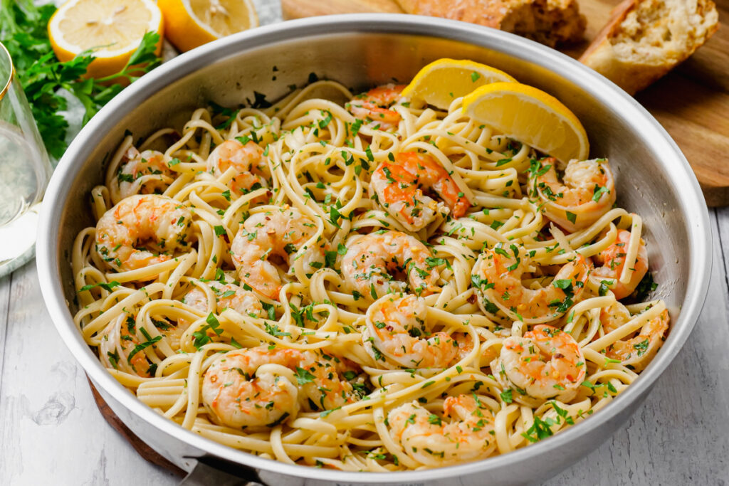 A skillet full of shrimp scampi