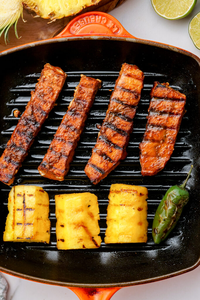 Grilling fish, pineapple, and jalapenos for fish tacos