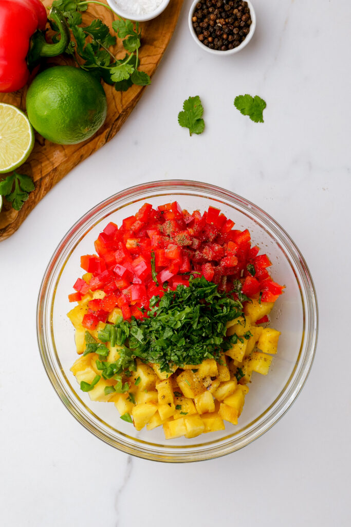 A bowl of grilled pineapple salsa for grilled fish tacos