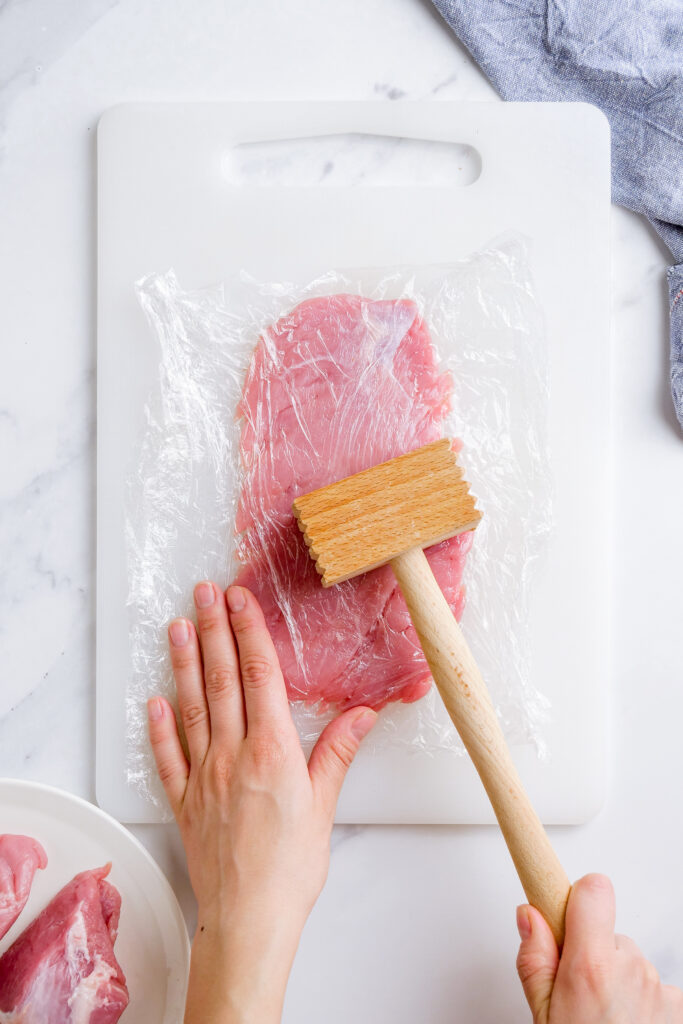 Season and pound pork tenderloin into cutlets for schnitzel