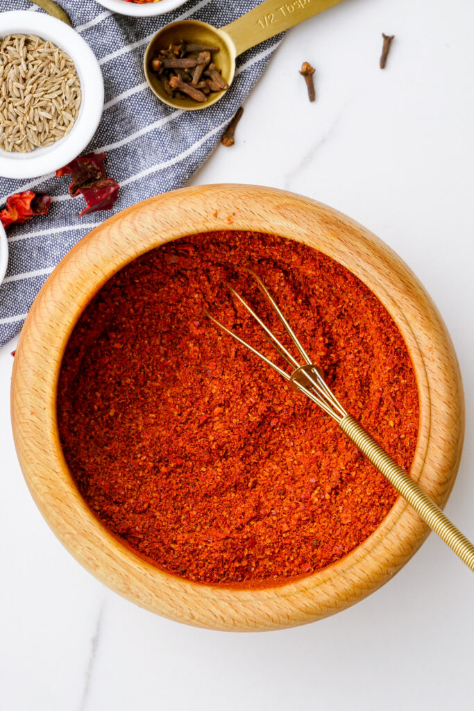 Spices being ground for a steak spice rub. 