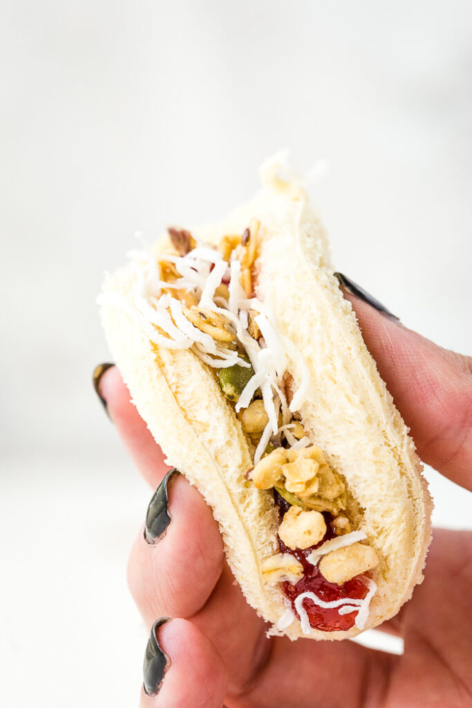 Peanut butter and jelly tacos, topped with granola and coconut