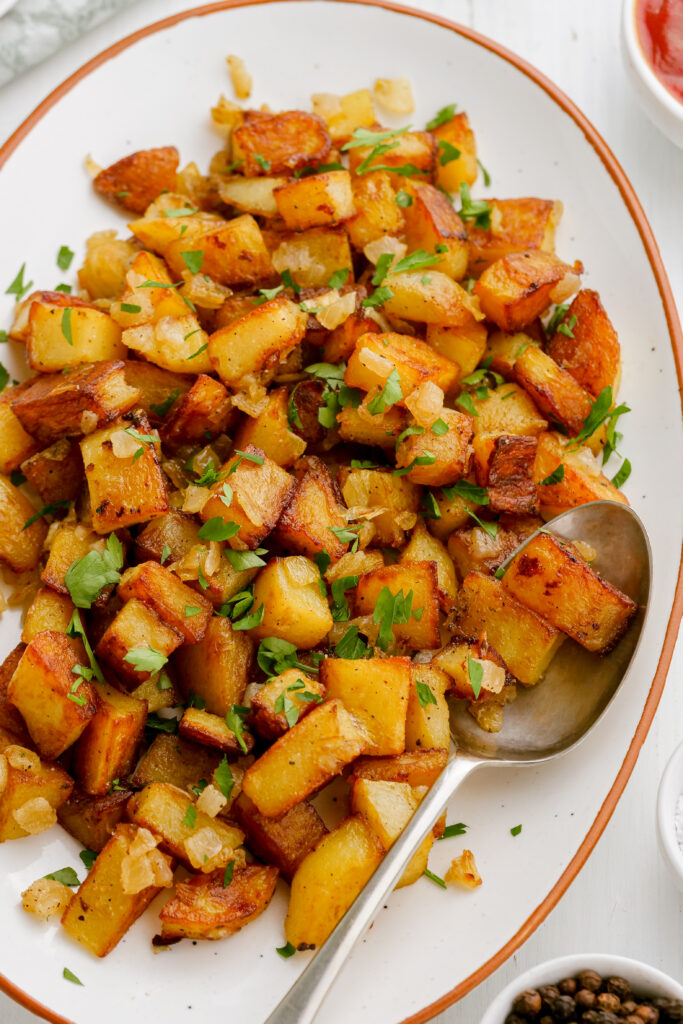 A delicious platter of crispy brown home fries a great side dish. 