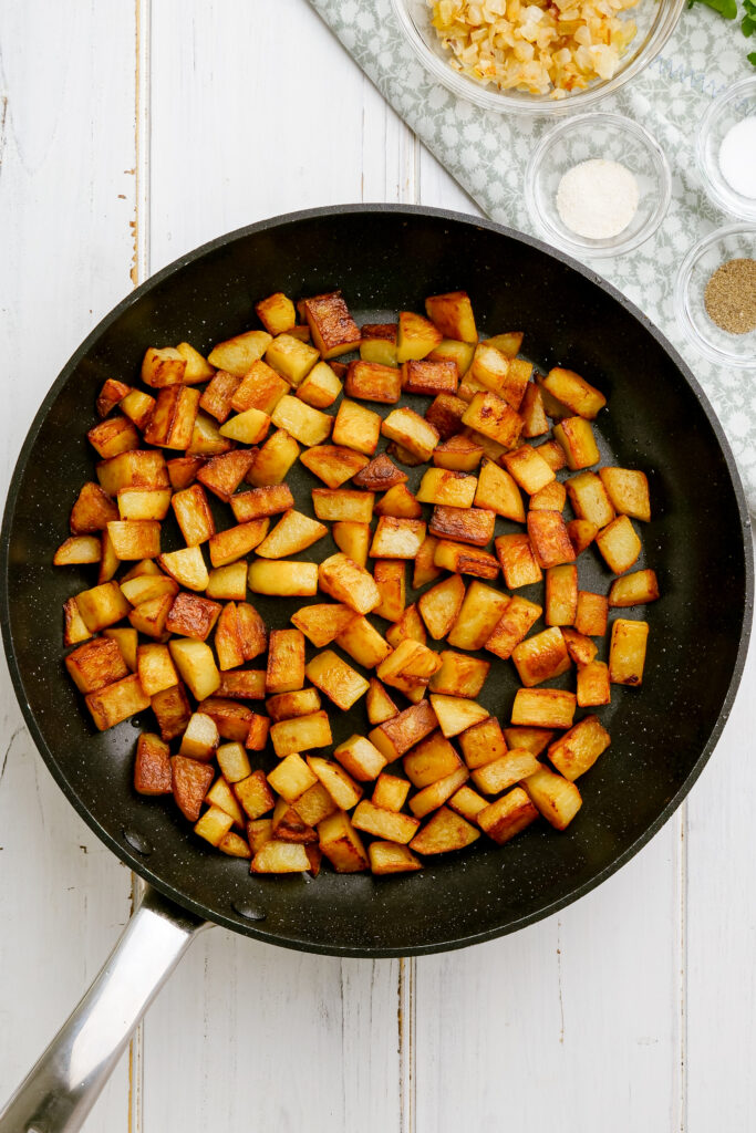 How to make home fries, flipping the potatoes over