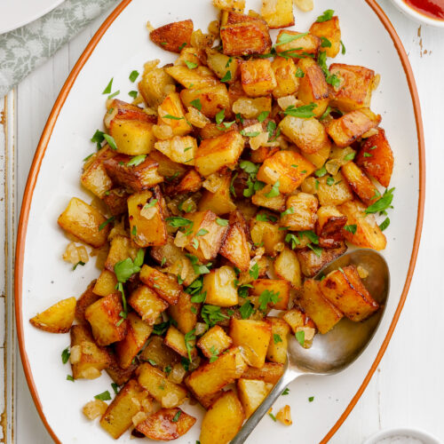 A big platter of home fries.