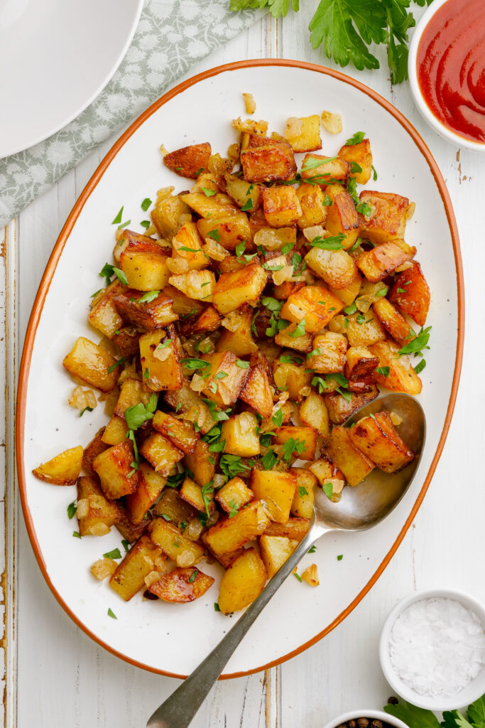 A big platter of home fries. 