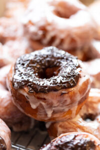 Sputnuts, or potato doughnuts are an easy homemade donut that is glazed and doused in chocolate
