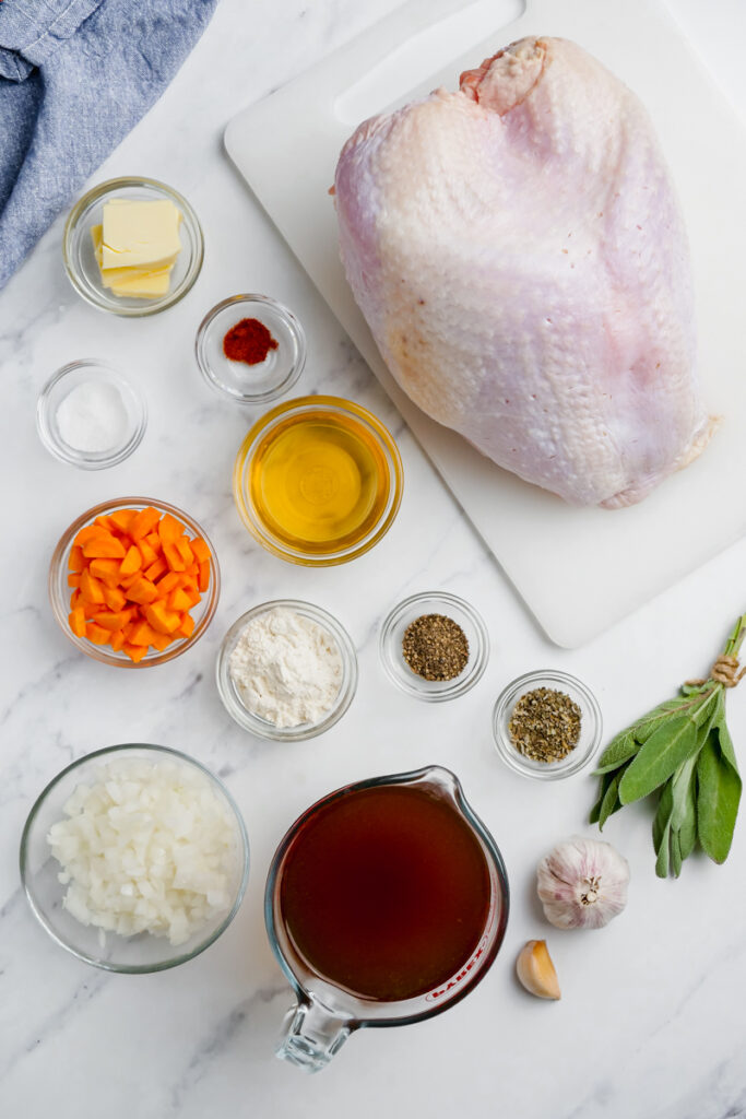Supplies for instant pot turkey breast and gravy on white background
