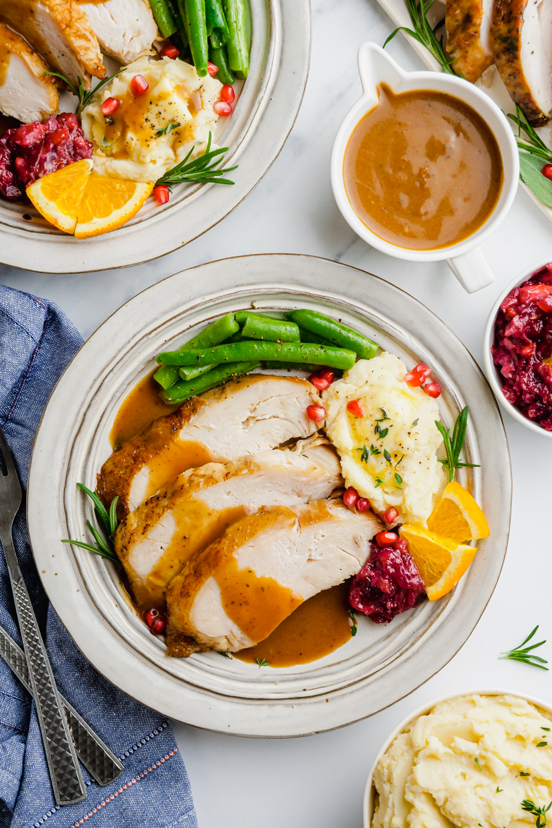instant pot turkey breast and gravy on white plate