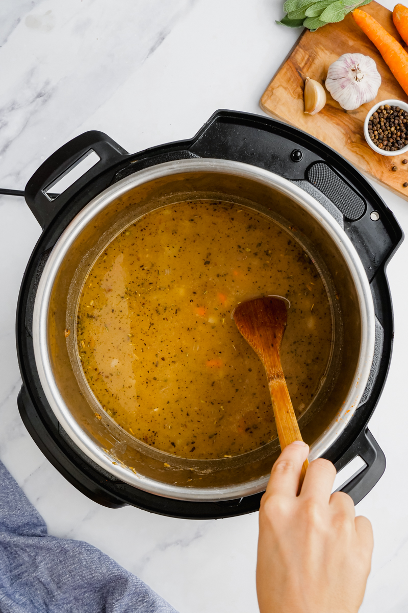 turkey being melted in instant pot in butter