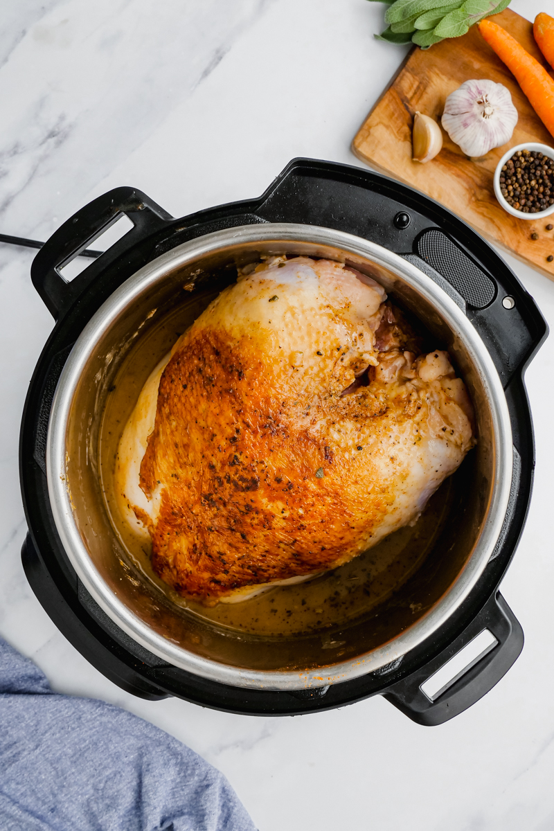 turkey being seared in the butter