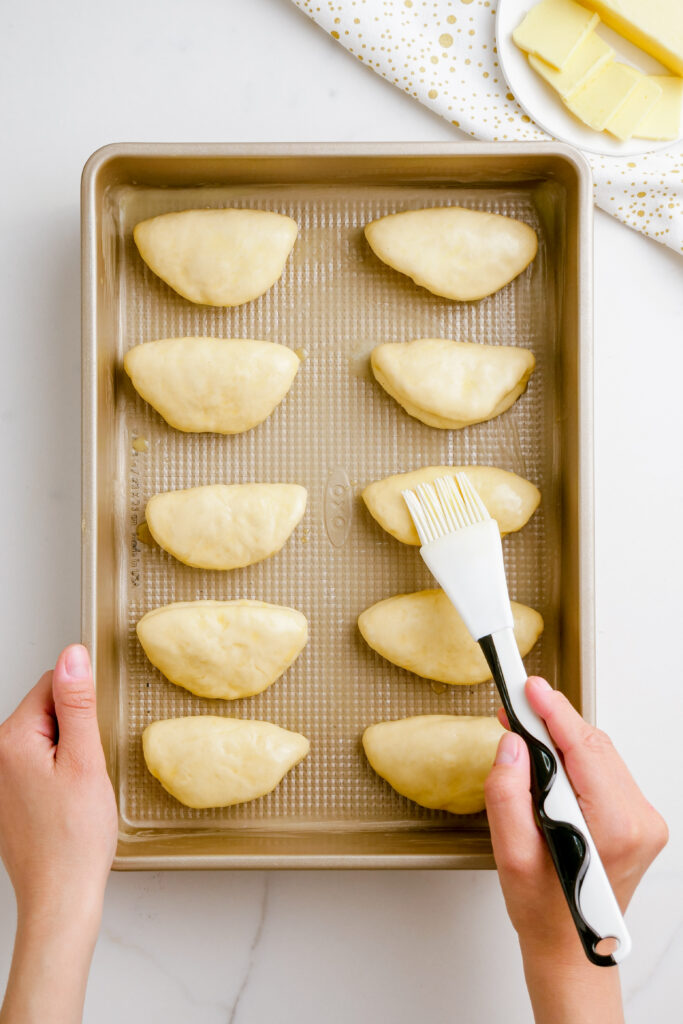 Egg wash on Parker House Rolls