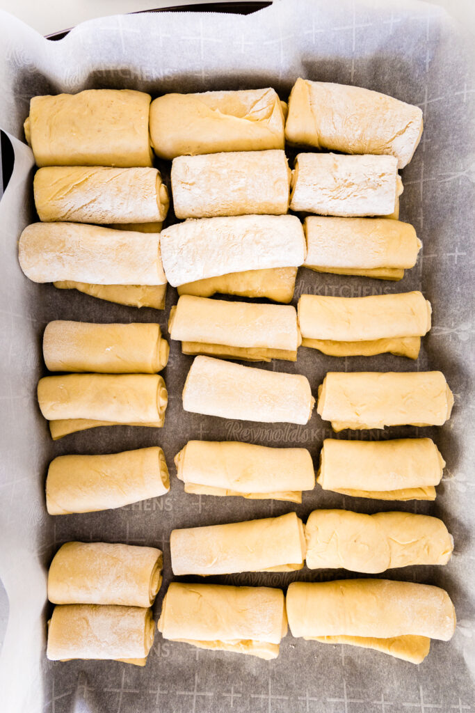 A tray of rolled out Lion House Rolls, ready for their second rise
