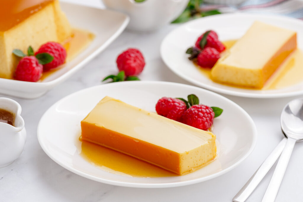 Sliced flan, on a serving plate, ready to be eaten