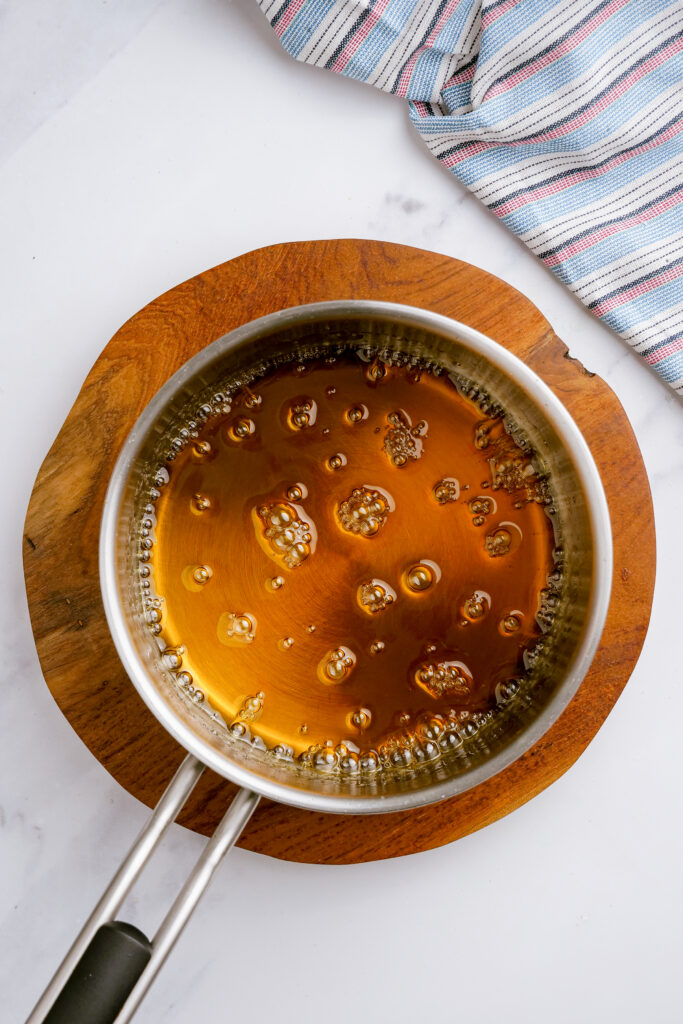 making the caramel sauce for flan