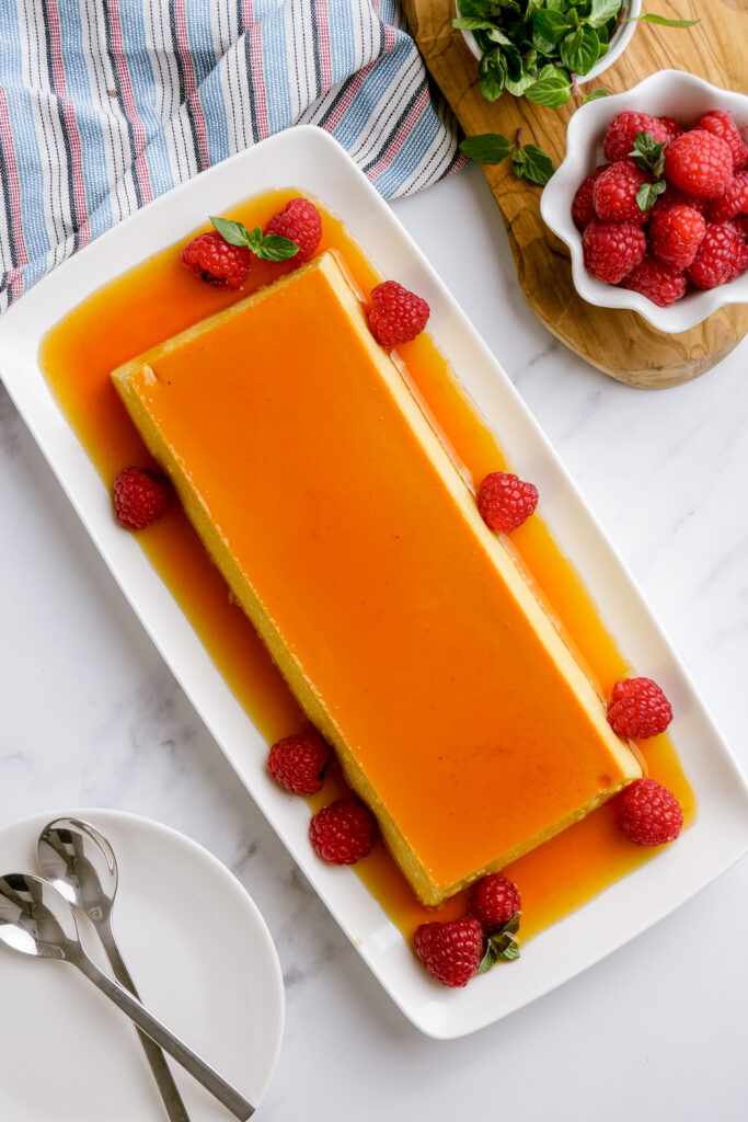 unmolded flan, on a white plan