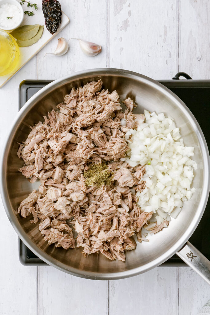 Cook pork after shredded until browned